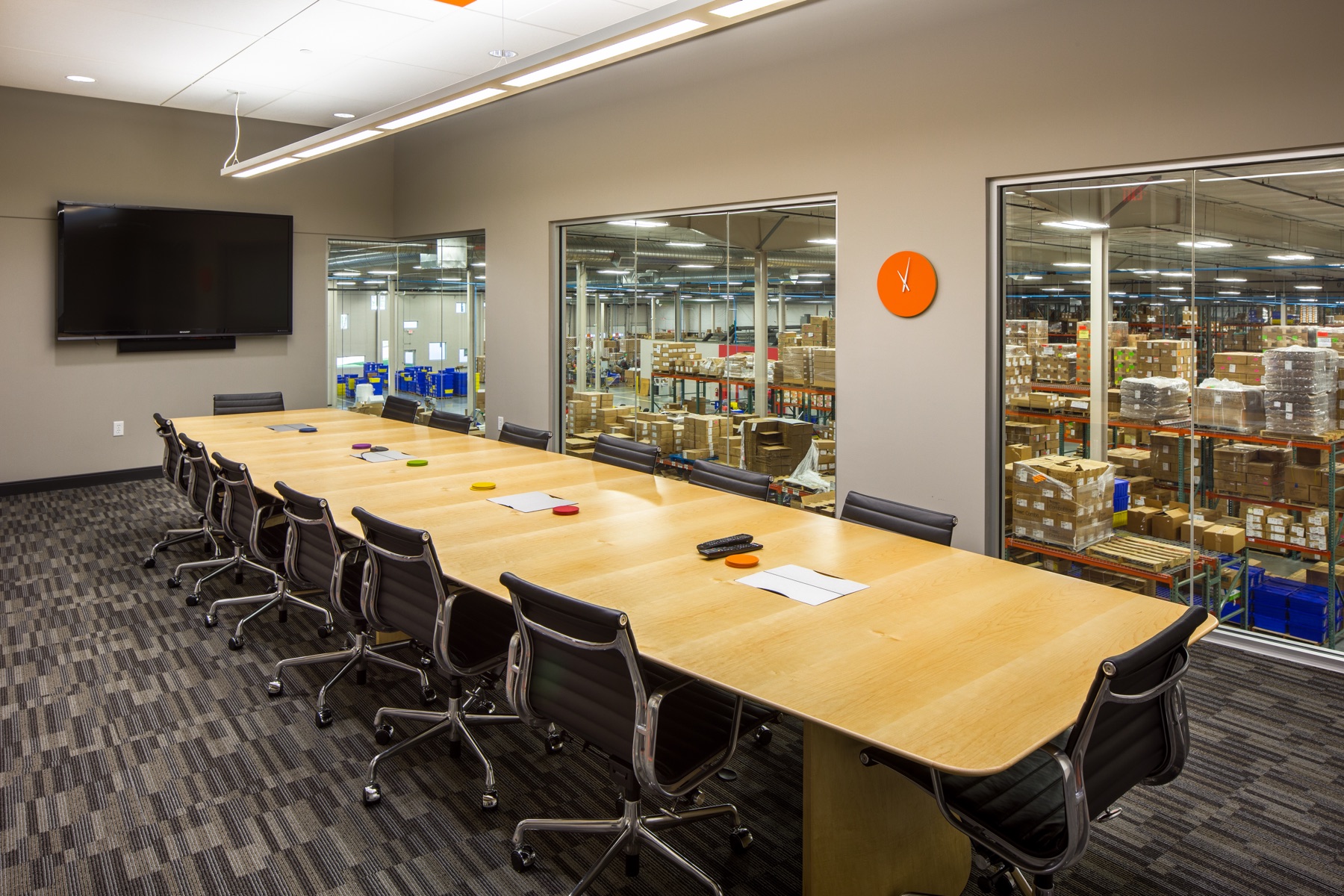 Haven-delivered headquarters — boardroom overlooking distribution floor